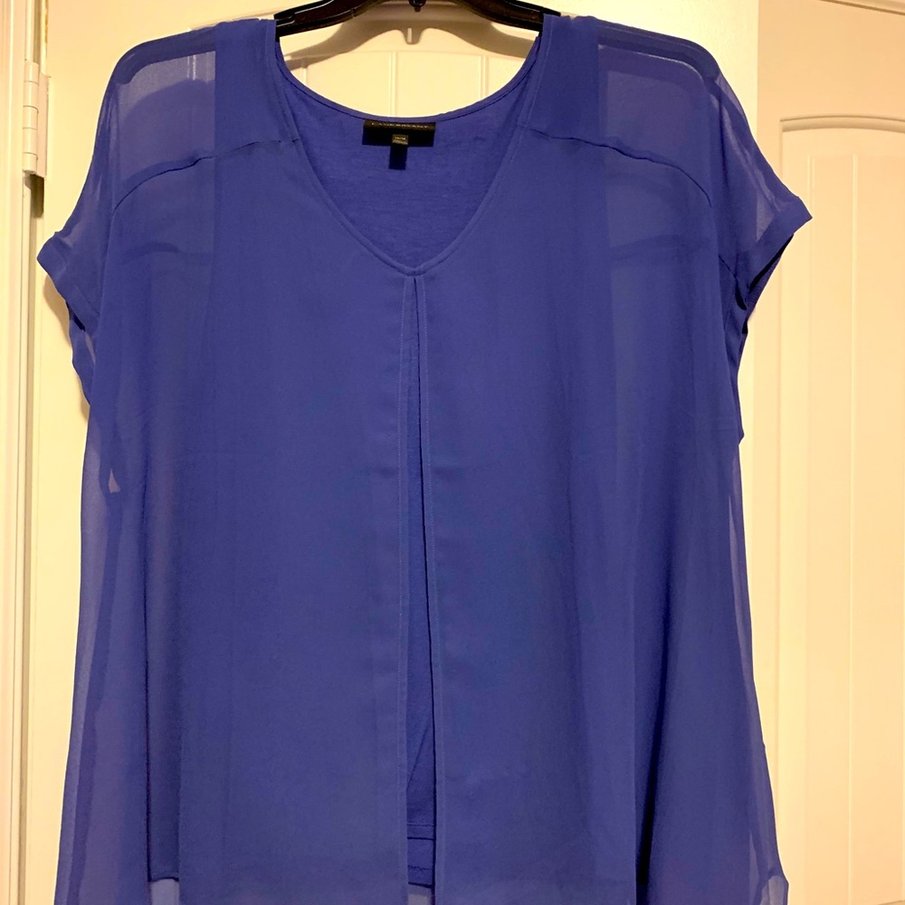 Women’s top with sheer overlay